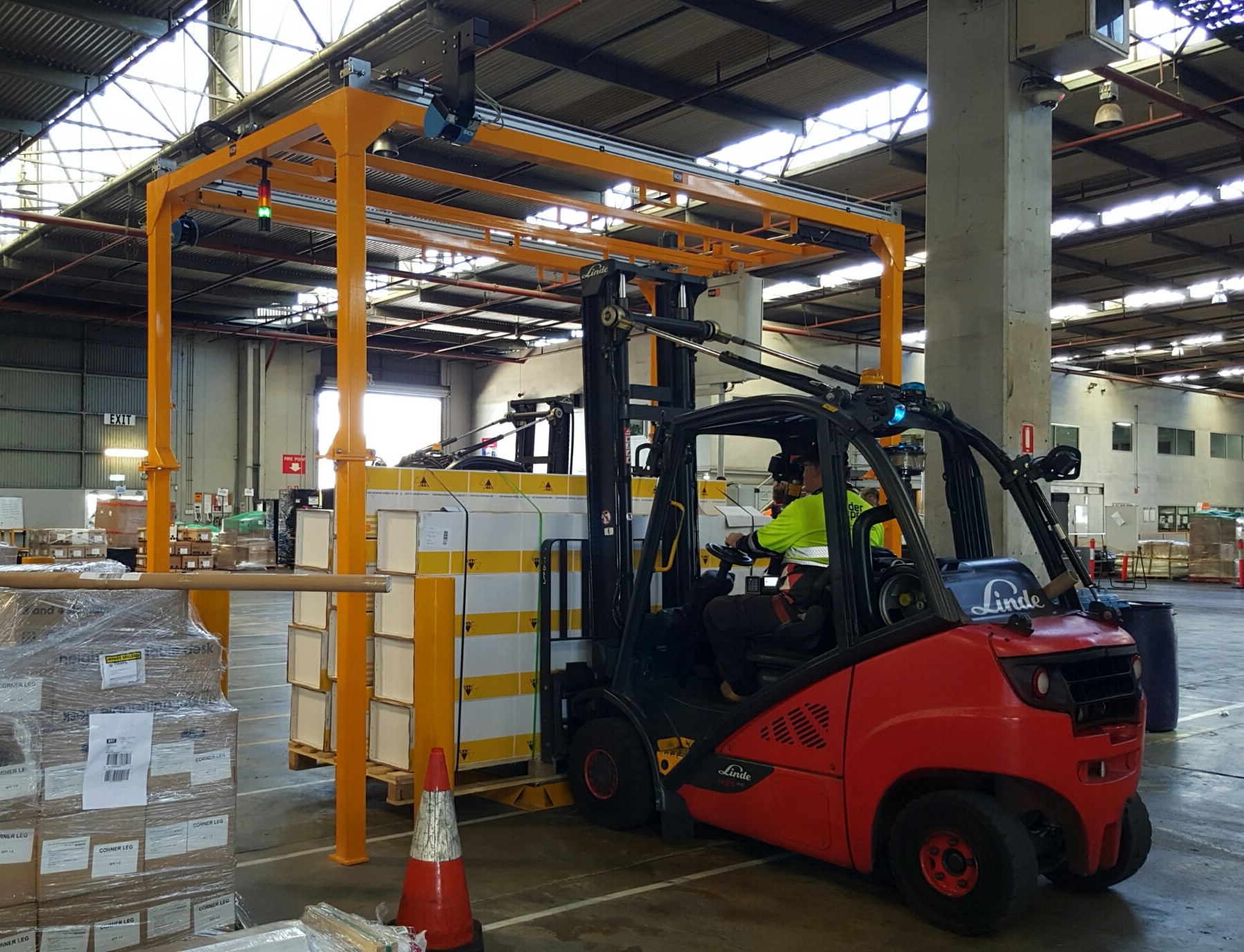 Forklift loading a Cubiscan 1200