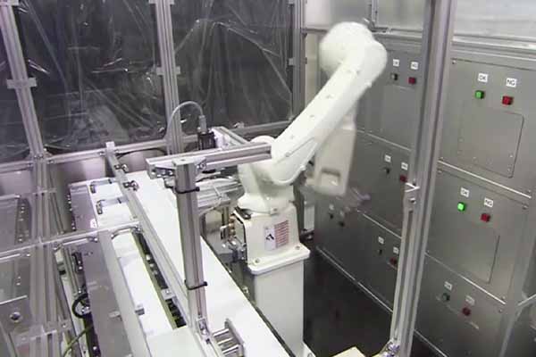 industrial robot in a machine tending application
